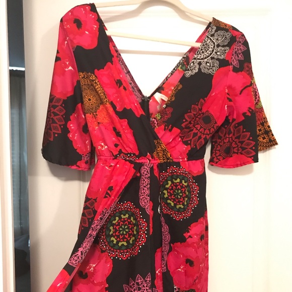 Other - Pretty floral romper with tail